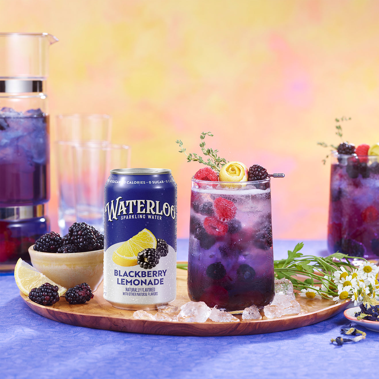 Refreshing Waterloo Blackberry Lemonade with berries and lemon garnish in a vibrant setting.